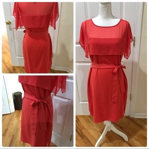 A salmon color dress